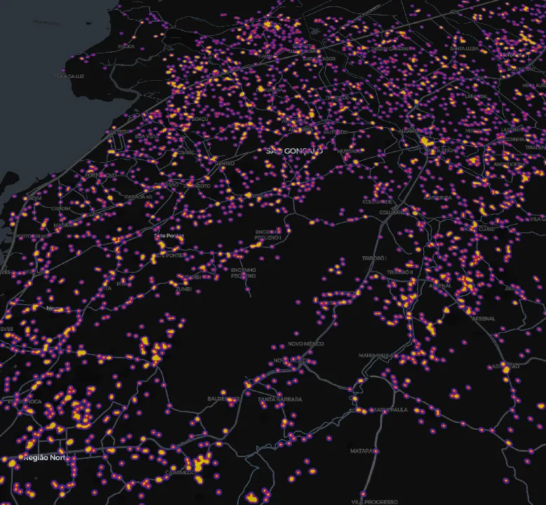 Mapa de calor da região de São Gonçalo (RJ), com pontos em tons de roxo e amarelo marcando a densidade de estabelecimentos religiosos